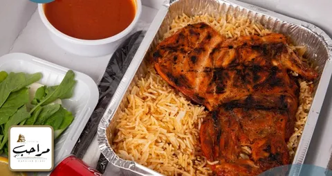 وجبة مندي الدجاج مع لبن أو مشروب غازي